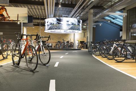 Shoppers are guided round the store by a faux-tarmac walkway